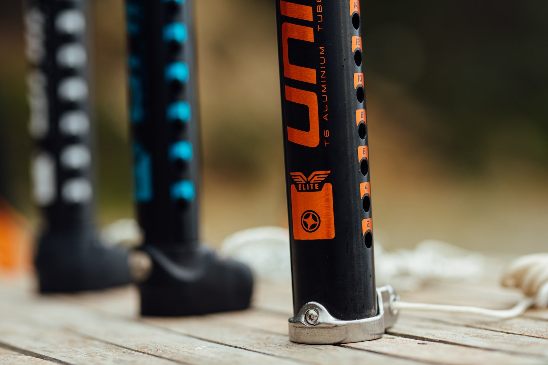 A close up image of a windsurfing extension from aluminum with orange label 